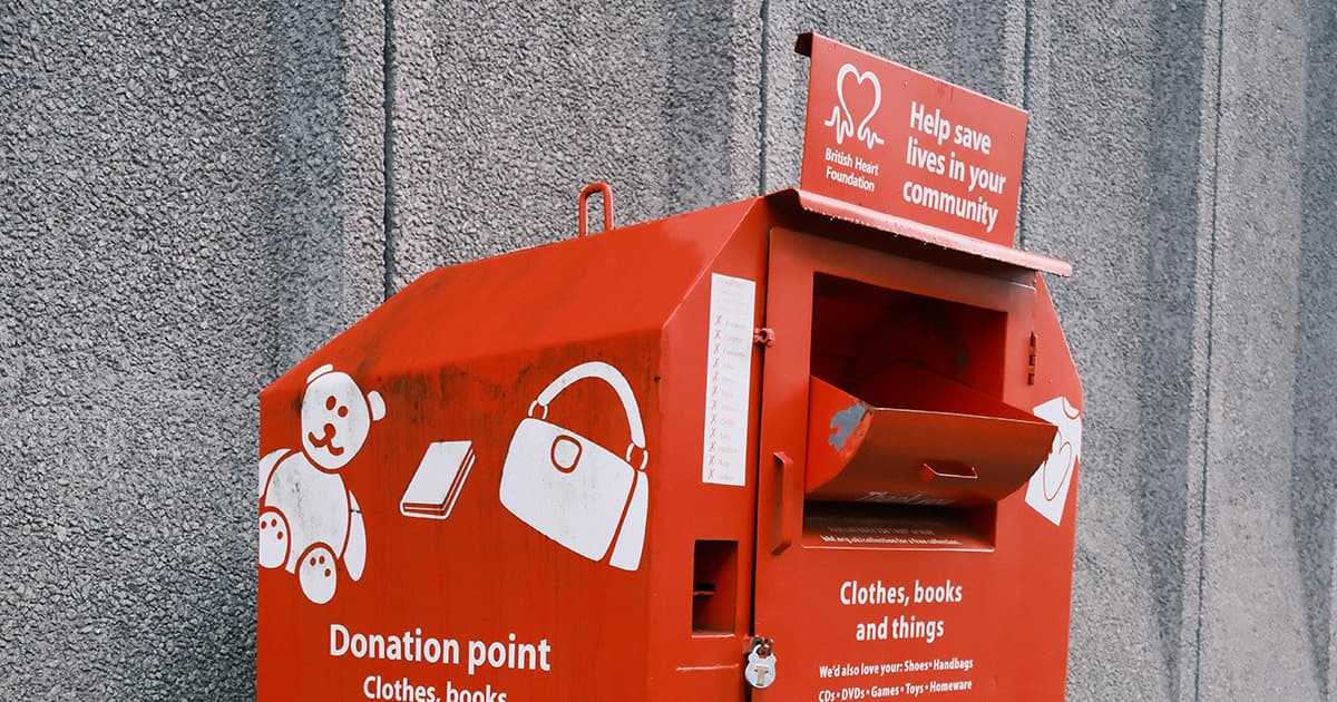 Clothing donation bins outside a collection center