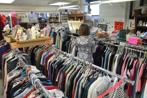 Woman shopping for clothes in a thrift store in New Jersey